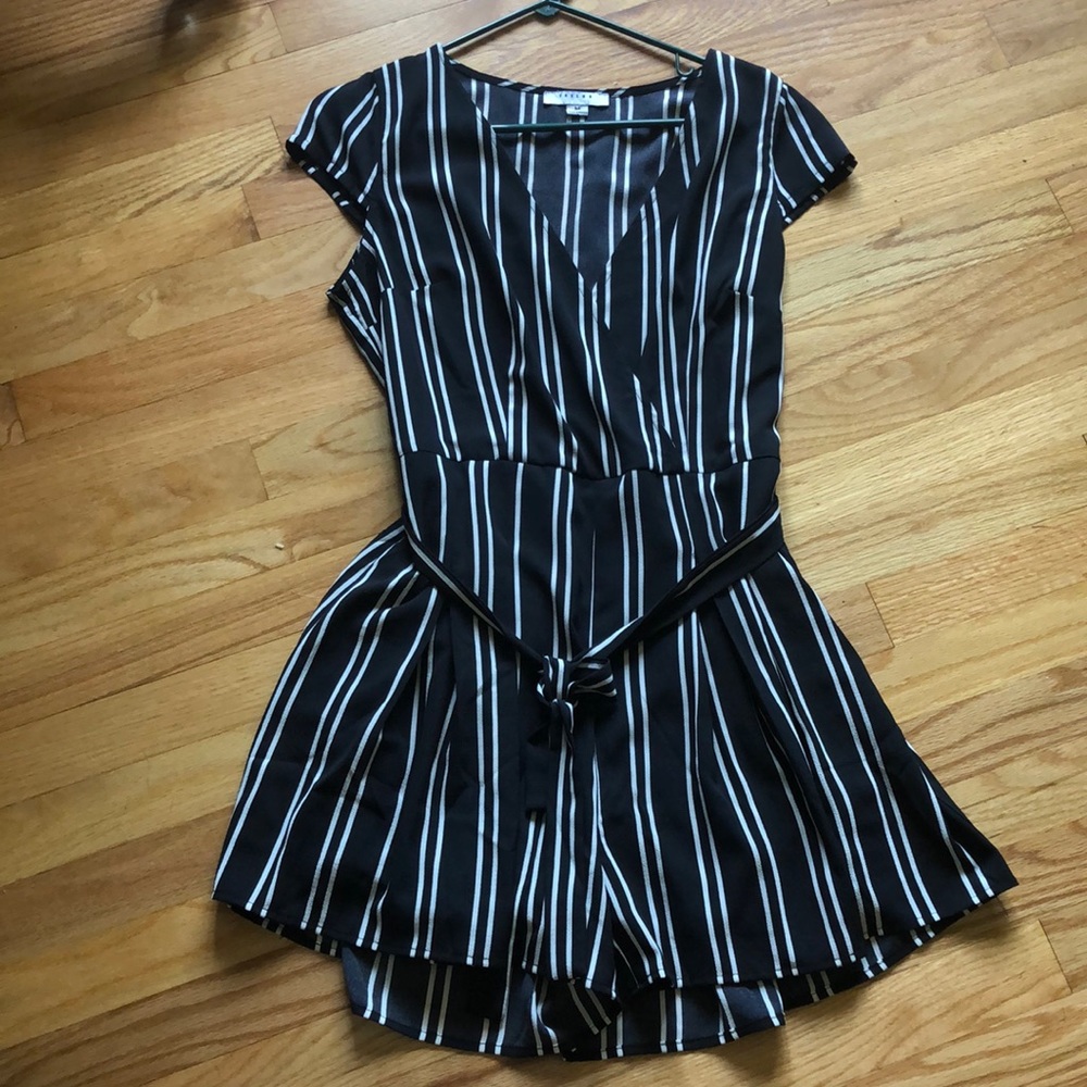 NWT BLACK & WHITE STRIPED ROMPER. With waist tie